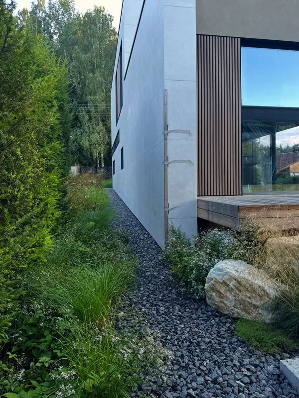 Modern residence framed by layered planting